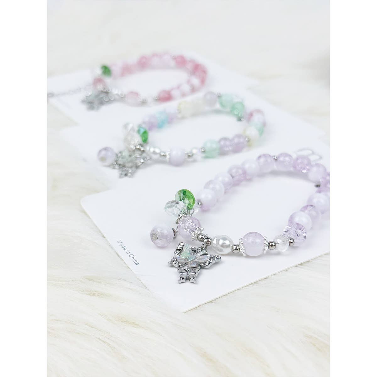 Soft Tone Butterfly Pendant Mix Bead Bracelet: MIX COLOR / ONE(12)